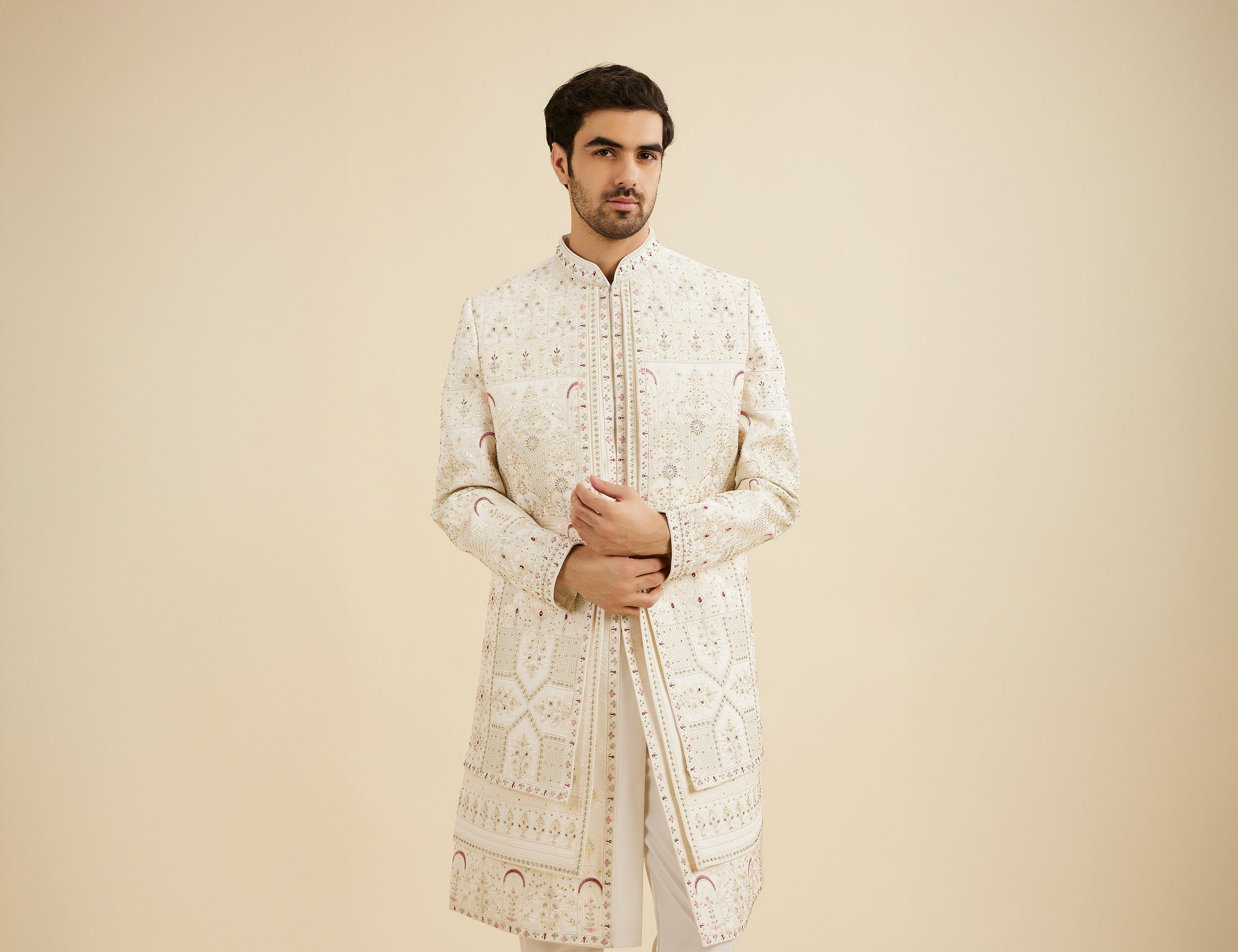  men wearing sherwani Layering with cream floral jackets for wedding day